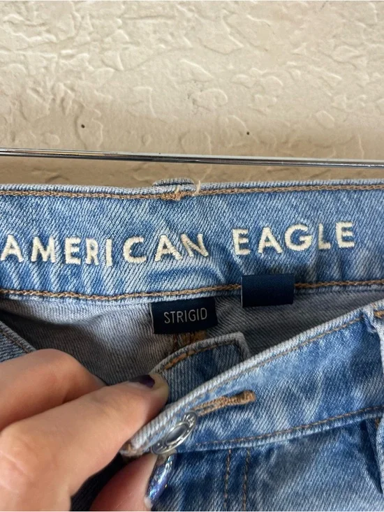 American Eagle Dreamy Drape Low Rise Flare Leg Jeans in Blue - Picture 12 of 14